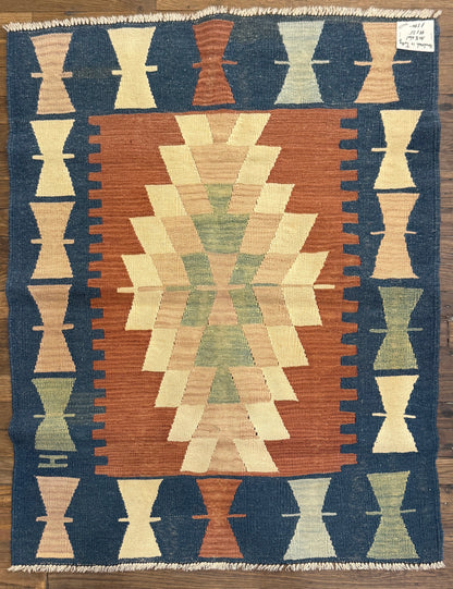 100% Wool - 44” x 35”